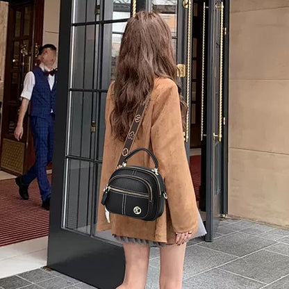 Sac classique multi-compartiments à bandoulière large et ajustable en cuir