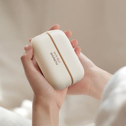 Chauffe-mains portable - soulage le froid et la douleur dans les mains