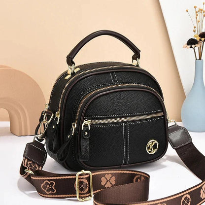 Sac classique multi-compartiments à bandoulière large et ajustable en cuir
